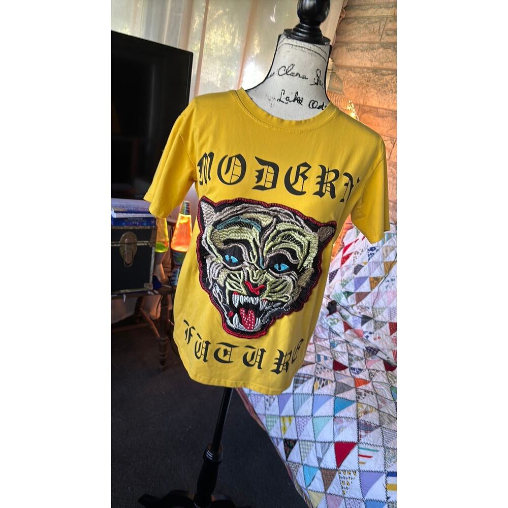 y2k Akira cat patch designer mustard tee